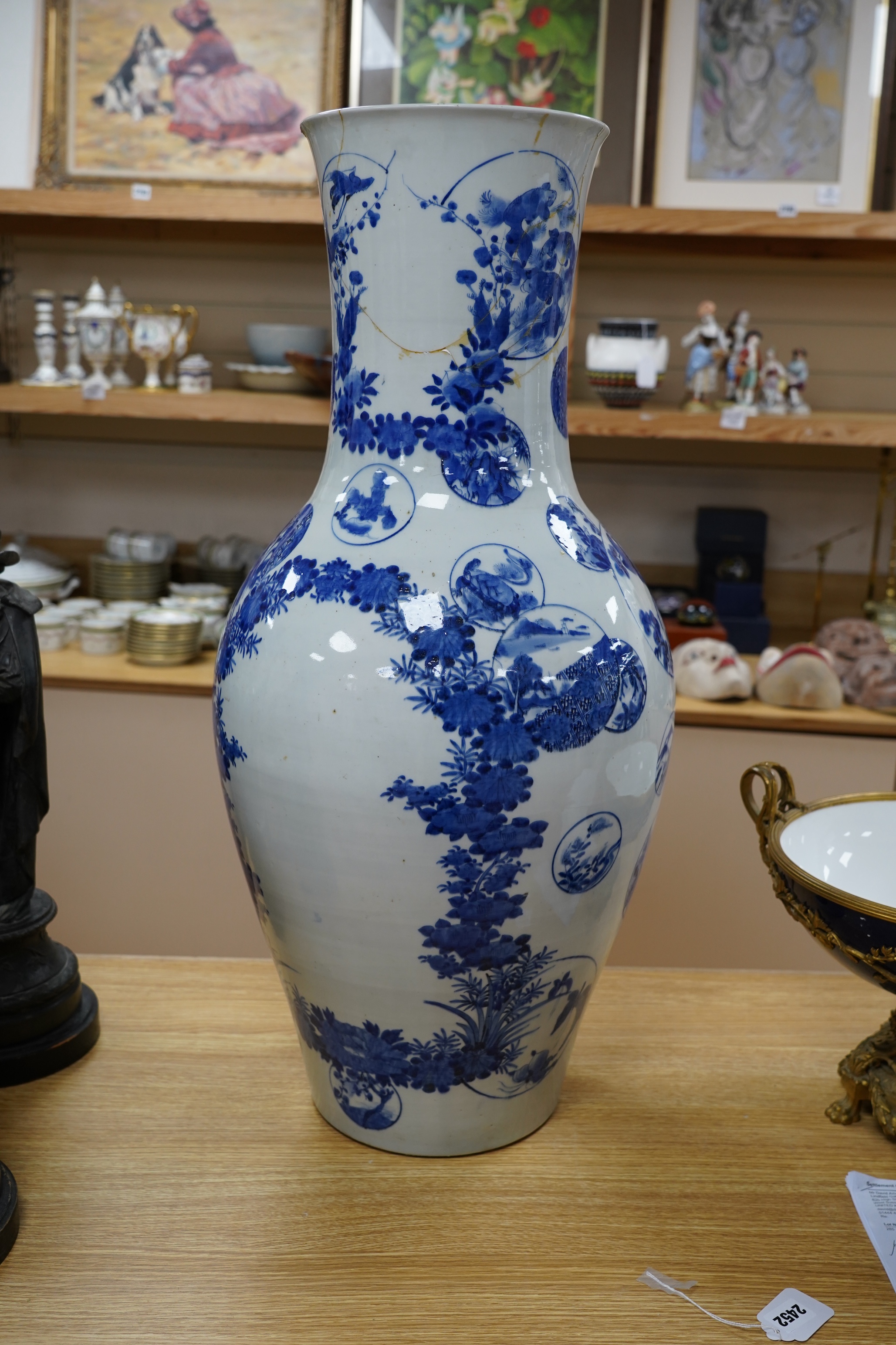 A massive late 19th century Japanese Arita blue and white vase, 79cm (damaged)